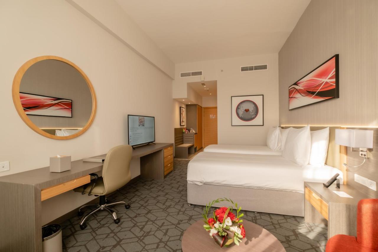 Peony Hotel ドバイ エクステリア 写真