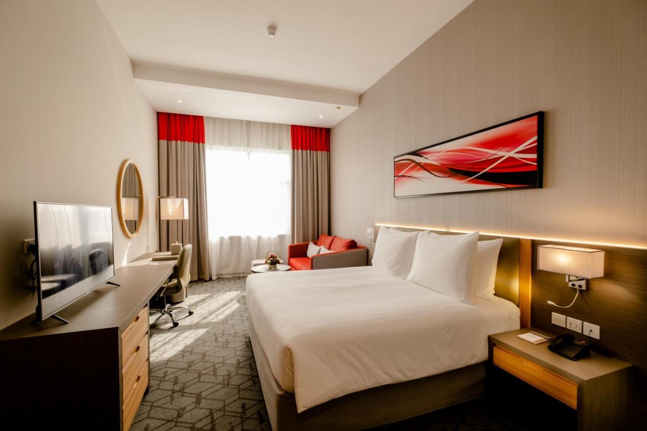 Peony Hotel ドバイ エクステリア 写真