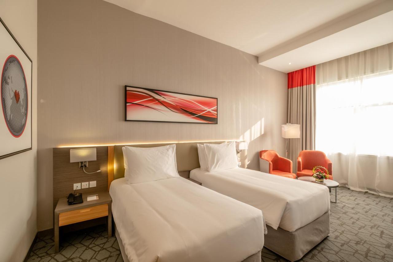 Peony Hotel ドバイ エクステリア 写真