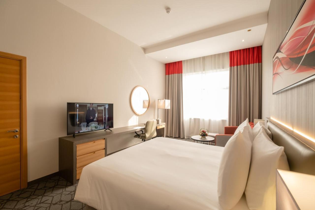 Peony Hotel ドバイ エクステリア 写真