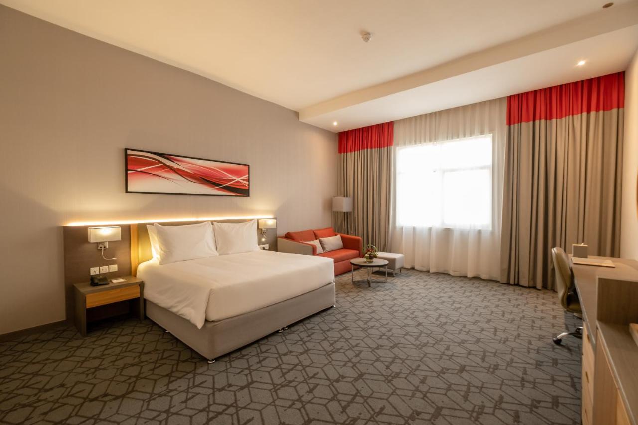 Peony Hotel ドバイ エクステリア 写真